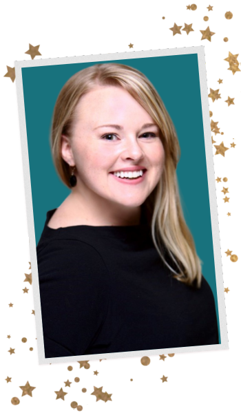 A slightly tilted picture frame with a photo of a fair-skinned woman with blonde hair smiling.